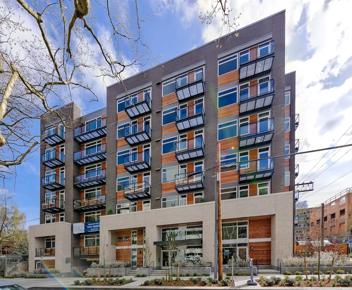 Exterior of The Perch showing steel balconies and brick cladding, Capitol Hill, Seattle